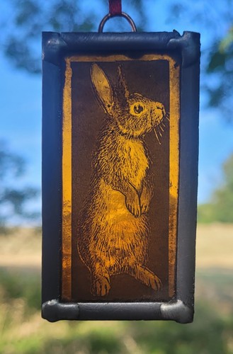 Stained glass rabbit amber - stained,