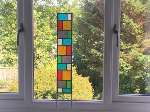 Stained glass garden sculpture